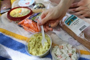 Picnicking is one of the many delights to be had while watching theatre outdoors.